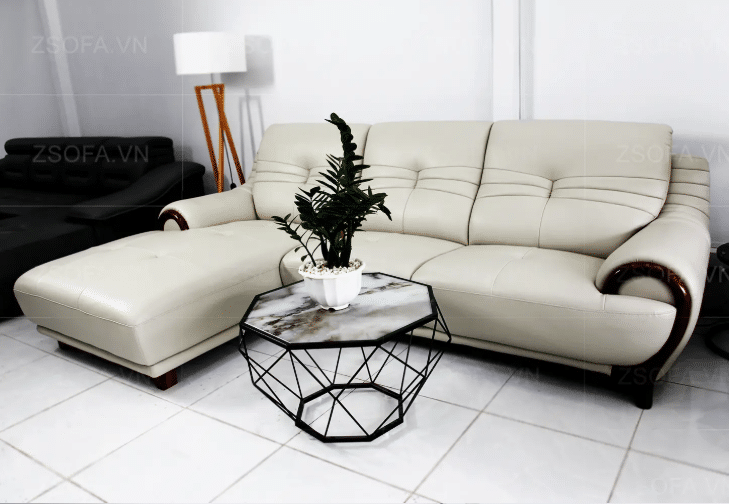 Bộ ghế sofa với gam màu trầm tính sang trọng kết hợp  với chiếc bàn hiện đại nhỏ xinh tạo ra một không gian hiện đại